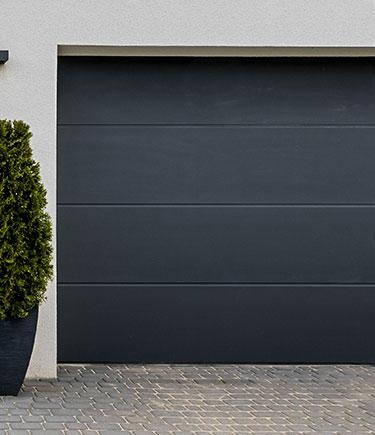 https://faytrimbuildinggroup.ca/wp-content/uploads/2025/03/Garage-door-Solutions.jpg